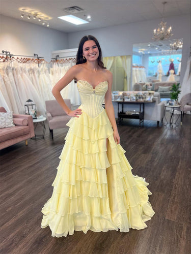 Yellow Strapless Tiered Ruffle Corset Prom Dress with High Slit