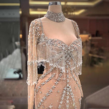 Modern Long Mermaid Beading Long Sleeves Prom Dress With Train