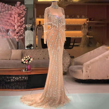 Modern Long Mermaid Beading Long Sleeves Prom Dress With Train